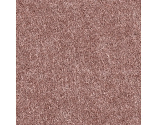 Gros plan d'une surface en feutre fibreux de couleur vieux rose.