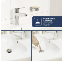 Mitigeur de lavabo avec garniture de vidage push-open sur un lavabo.