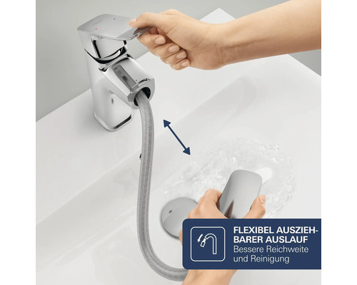 Mitigeur de lavabo avec bec extractible et flexible utilisé dans un lavabo.