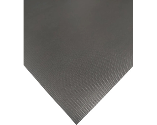 Gros plan d'un film plastique texturé ou d'un tapis de protection.