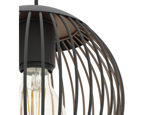 Suspension de style industriel avec abat-jour en métal noir et ampoule LED à filament.