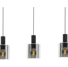 Suspension à trois lampes avec abat-jour cylindriques en verre et ampoules à filament LED visibles sur câbles noirs.