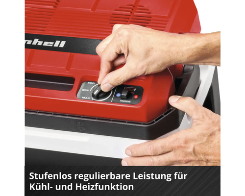 Main réglant le bouton rotatif d'une glacière Einhell pour le réglage continu de la puissance de refroidissement et de chauffage.