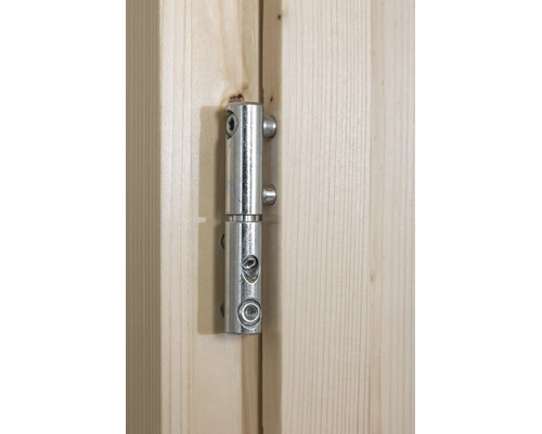 Fiche à visser en métal montée sur une porte en bois, charnière en deux parties pour portes d'intérieur en bois de résineux clair.