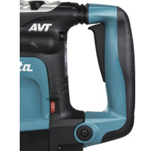 Detailansicht des Handgriffs einer Makita Bohrmaschine mit Schalter und AVT Schriftzug