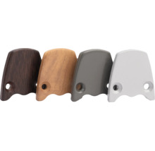 Quatre embouts pour support de main courante dans différentes imitations de bois et teintes métalliques avec trous de perçage