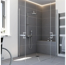 Cabine de douche moderne avec porte pliante en verre, colonne de douche chromée et carrelage gris