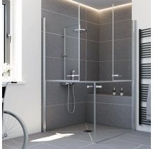 Douche d'angle accessible avec portes battantes mi-hauteur en verre, espace douche carrelé gris et mitigeur.