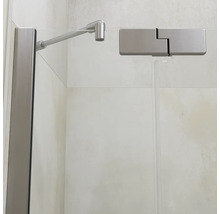 Paroi de douche en verre avec barre de maintien et charnière en métal pour une cabine de douche moderne.