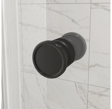 Poignée encastrée ronde pour portes coulissantes au design moderne montée sur un mur carrelé
