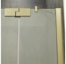 Paroi de douche en verre avec profilé charnière et barre de stabilisation dorés pour montage mural.