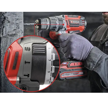 Perceuse visseuse à percussion sans fil Einhell en utilisation avec vue détaillée des réglages de couple et de fonction.