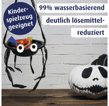 Spinnenkorb aus Lack für Kinder mit Süßigkeiten und bemalter Kürbis mit Hinweisen zu Eignung für Kinderspielzeug und reduziertem Lösemittelgehalt