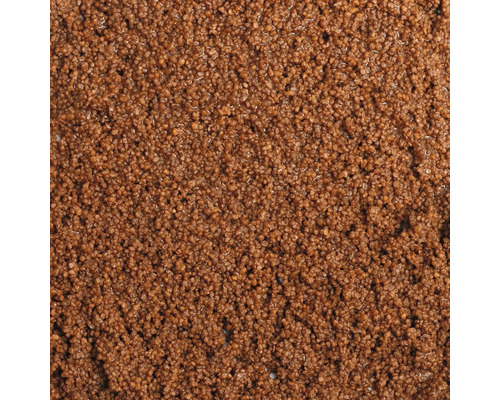 Surface texturée en enduit minéral à grain fin en gros plan
