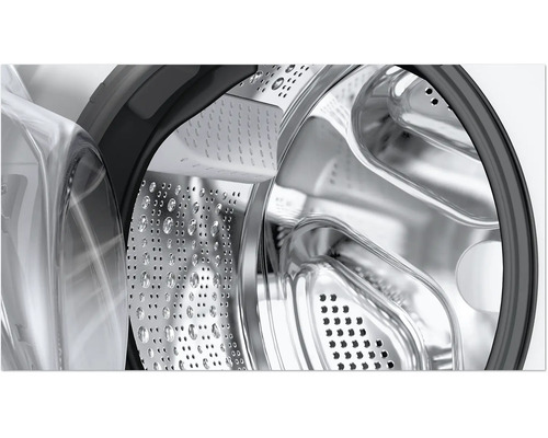 Vue détaillée du tambour en acier inoxydable d une machine à laver avec structure perforée et aubes de tambour