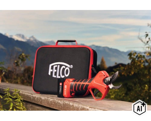 Sécateur à batterie FELCO avec mallette de transport devant un paysage de montagne. (Image AI modified or generated)