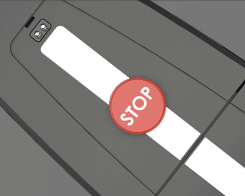 Detailansicht eines Not-Aus-Schalters auf einem Laufband