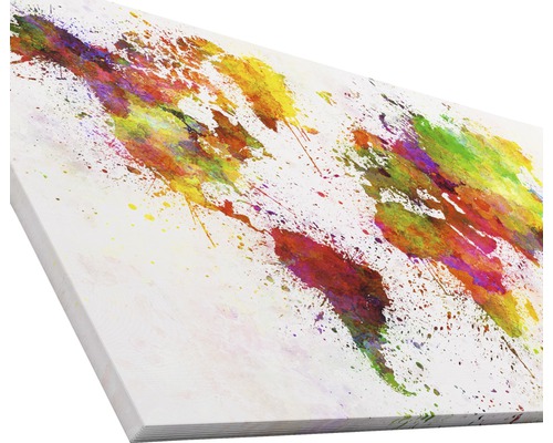 Carte du monde sur toile avec des éclaboussures de peinture