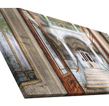 Leinwandbild mit einer Ansicht einer renovierungsbedürftigen Fassade mit Treppe