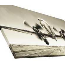 Leinwandbild eines Flugzeugs im Start