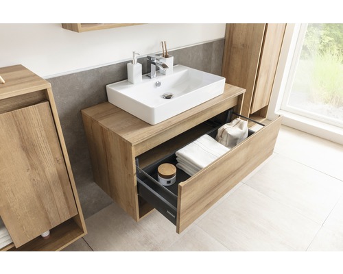 Salle de bains moderne avec meuble-lavabo, vasque à poser et tiroir ouvert