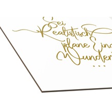 Décoration avec la citation Soyez réaliste, planifiez des miracles