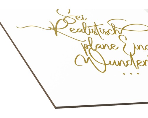 Décoration avec la citation Soyez réaliste, planifiez des miracles