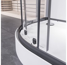 Vue détaillée d''une cabine de douche avec portes en verre transparent et cadres sombres