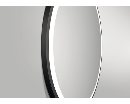 Vue détaillée d''un miroir rond avec éclairage LED