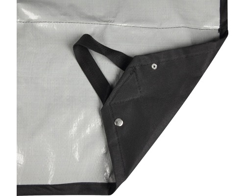 Vue détaillée d''une bâche de protection avec des œillets et une boucle de transport