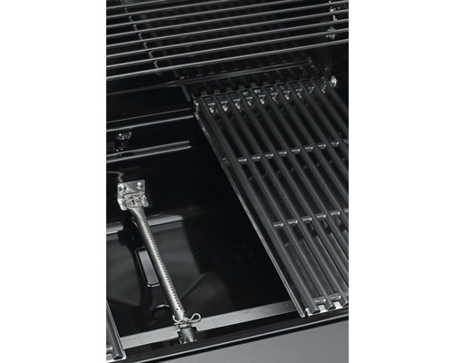 Intérieur d''un barbecue avec grille et brûleur