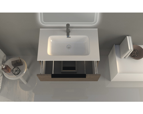 Vue de dessus meuble sous-lavabo avec lavabo et robinetterie dans salle de bain