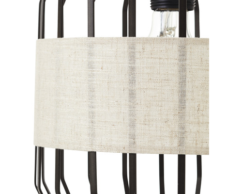Vue détaillée d''une lampe avec abat-jour en tissu et structure métallique