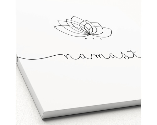 Leinwandbild mit stilisierter Lotusblüte und dem Schriftzug Namasté