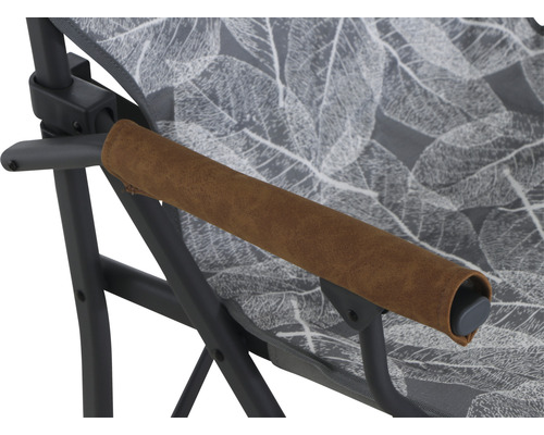 Vue détaillée d''une chaise de camping avec accoudoir et motif de feuilles