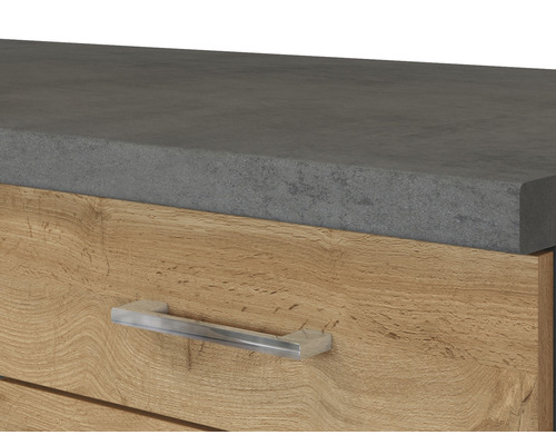 Detailansicht eines Waschtischunterschranks mit Schublade, Arbeitsplatte und Griff