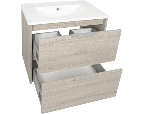 Meuble sous-vasque avec deux tiroirs ouverts et lavabo en céramique