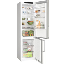 Réfrigérateur-congélateur ouvert avec des aliments
