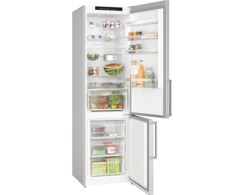 Réfrigérateur-congélateur ouvert avec des aliments