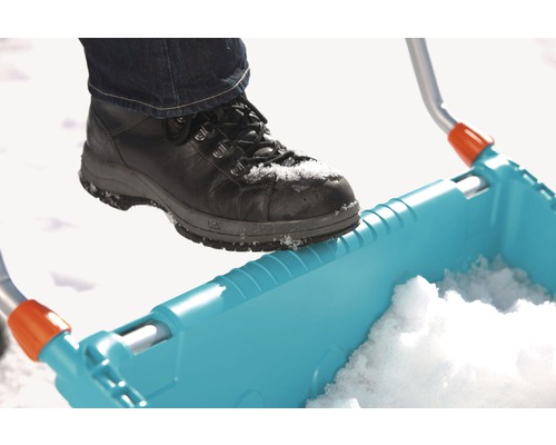 Chaussure sur une pelle à neige