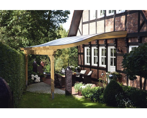 Toit de terrasse en bois avec coin salon dans le jardin