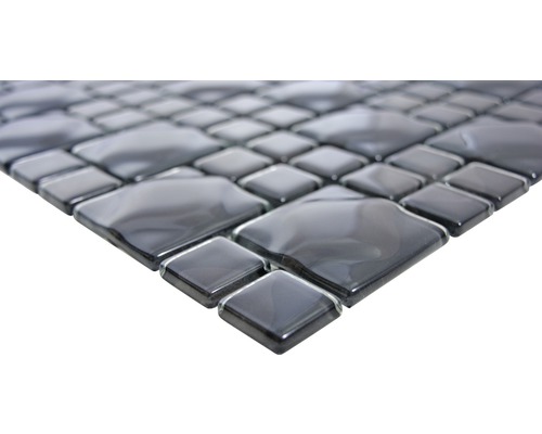 Gros plan d''une mosaïque avec des pierres carrées et en forme de losange