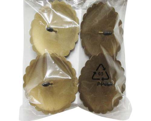 Quatre patins pour meubles avec bordure florale dans un emballage