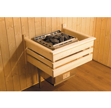 Poêle de sauna avec pierres et revêtement en bois sur mur en bois