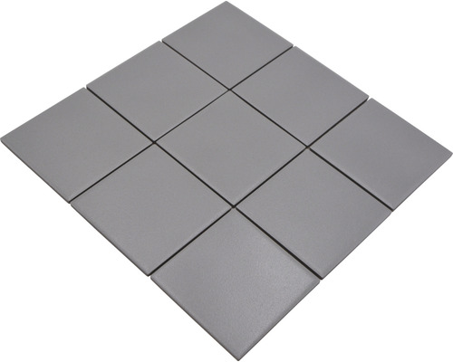 Neuf carreaux de mosaïque gris disposés en carré
