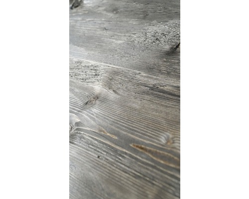 Gros plan d''une surface en bois grise avec grain