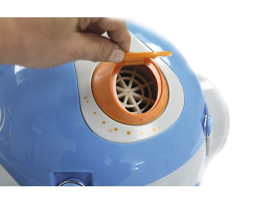 Gros plan d''un sèche-linge avec trappe d''aération ouverte