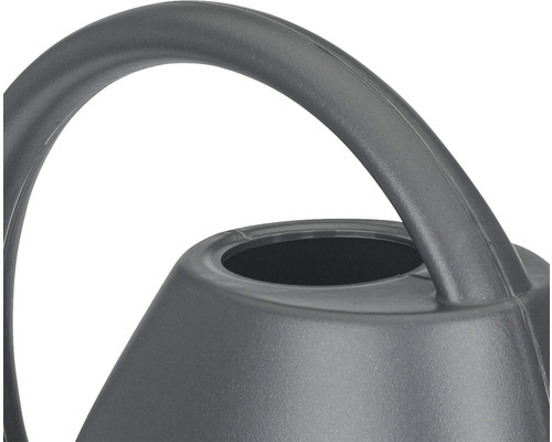 Gros plan d''un arrosoir avec poignée