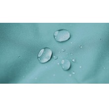 Gros plan de gouttes d''eau sur un tissu hydrofuge