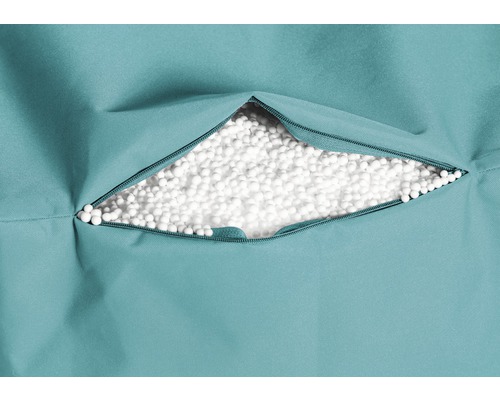 Gros plan d''un pouf avec fermeture éclair et rembourrage